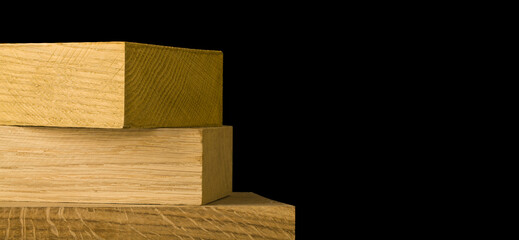 Wooden blocks, boards isolated on a black background.
