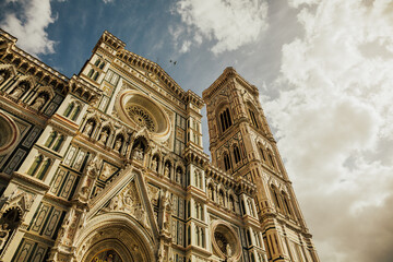 The Cattedrale di Santa Maria del Fiore (Cathedral of Saint Mary of the Flower) is the main church of Florence, Italy. Detail of the facade Cathedral Santa Maria del Fiore in Florence, Italy.