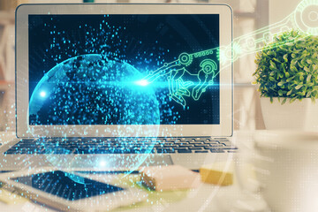 Multi exposure of desktop computer and technology theme hologram. Concept of software development.