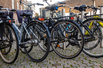 Fototapeta na wymiar Numerous bicycles parked in the street, Copenhagen, Denmark