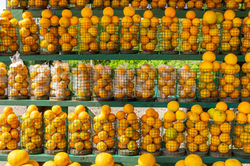 Oranges for sale in baskets, outdoor market