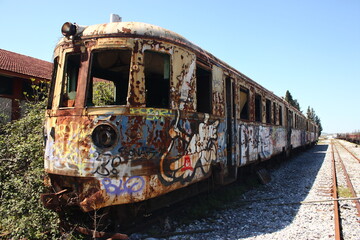 Fototapeta na wymiar Old rusty abandoned locomotive train