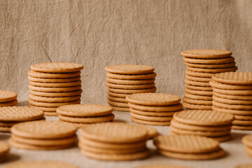 Stack of cereal biscuits as background. Delicious homemade wheat biscuits ready to eat.	