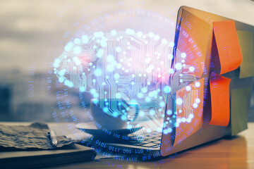 Multi exposure of work space with computer and human brain hologram. Brainstorm concept.