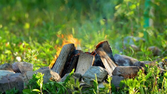 Closeup shot of the backyard bonfire, taken with a super tele lens in UHD
