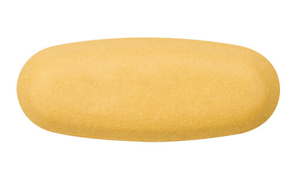 Closeup of yellow pill isolated on white background