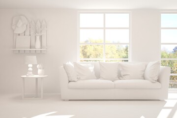 White stylish minimalist room with sofa and autumn landscape in window. Scandinavian interior design. 3D illustration