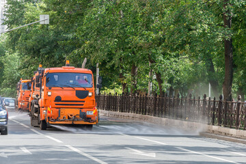 Obraz premium Water truck International in the city street.