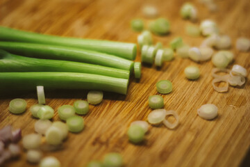 Young Onions on wood.