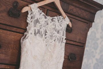 Obraz na płótnie Canvas Lave fifties wedding dress hanging