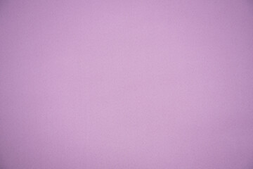 The texture of the fabric is a delicate pink color. Background, texture. The basis for a postcard. Pastel shade.