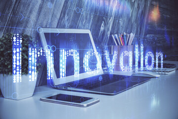 Obraz premium Multi exposure of computer on background and technology theme drawing. Concept of innovation.