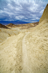 hikink the golden canyon - gower gulch circuit in death valley, california, usa