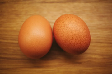 Eggs on wooden table.