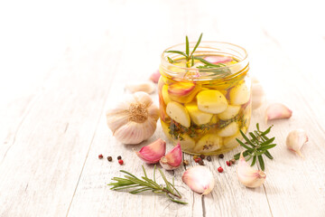 marinated garlic with olive oil and rosemary