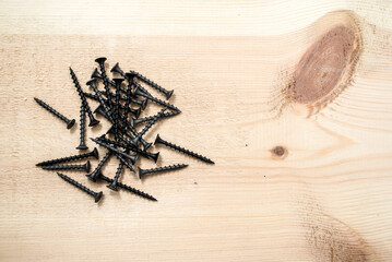 Screws for wooden boards. Carpentry workshop