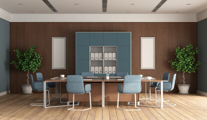 Modern boardroom with blue furniture and wooden panel on background