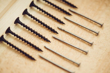 Set of screws and nails for boards