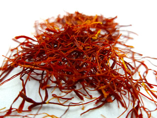 Naklejka premium saffron on white background, kesar, crocus, saffron background, pile of saffron,