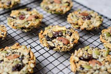 Mixed Nut and Dried fruits and Seeds Florentine, Gluten free whole foods Healthy biscuit cookies. set on cafe table.
