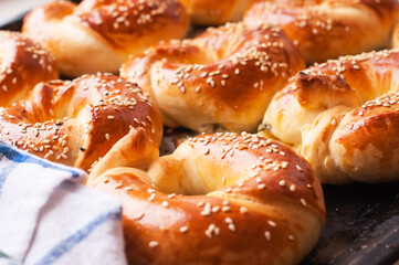 Homemade yeasty buns with cheese and herbs.