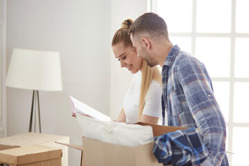 happy Young couple moving in new home