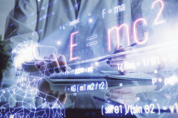 Science formula hologram over woman's hands taking notes background. Concept of study. Double exposure