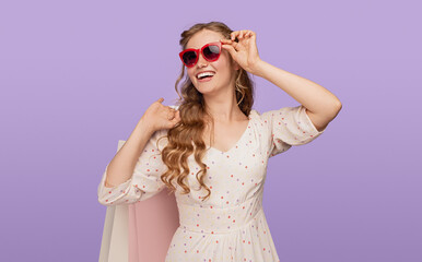 Delighted young female during shopping