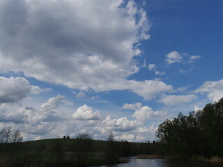 Fototapeta premium clouds over the river amazing