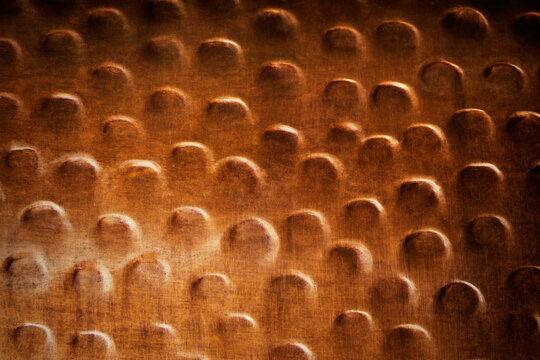 Hammered Brown Copper Abstract Background For Texture Or Background