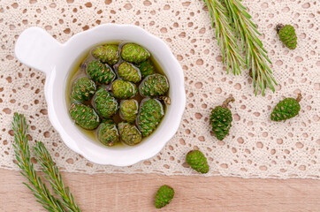 Green cones in yellow syrup