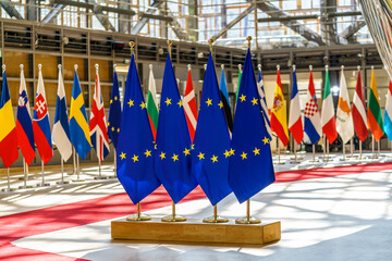 European Union flags in a flag rack and flags of the European Union countries 