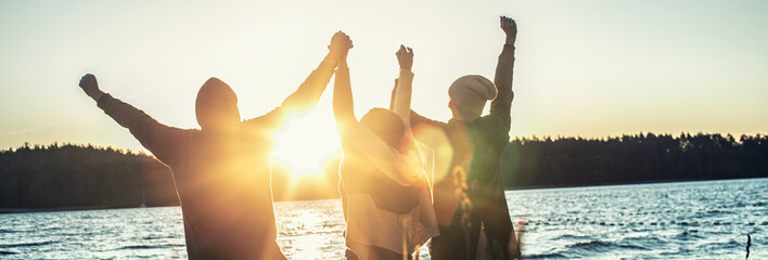 Group of Happy Friends having Fun Together Outdoors.