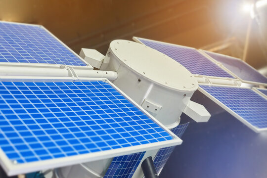 Layout or working model of a satellite for communication, navigation, or telecommunications from space.