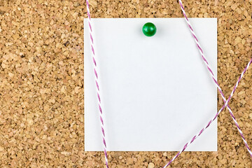 Workspace, mock up - square note pinned to the cork board, decorated with threads