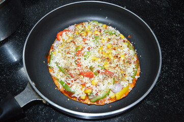 frying pan with Pizza