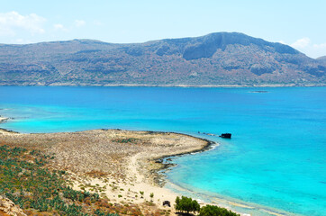 Obraz premium Greece Crete. Beautiful sea coast of Gramvousa island. Bird's eye view for sea and mountains. Postcard, offer or advertisement for travelers.