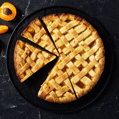 close-up of a sliced apricot shortcrust pie
