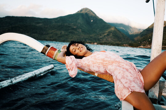 Woman on the boat of fisherman yahting sailing