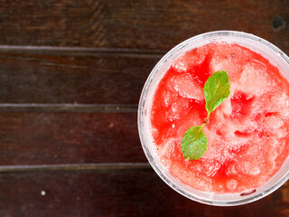 Watermelon juice, placed on a wooden table