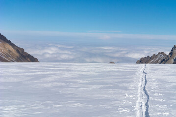 Glacier and radomos peaks. Ski tour at an altitude of 3600-4600 meters above sea level