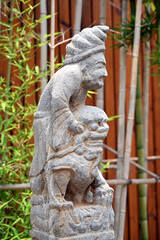 Ancient Chinese figures and lion stone sculptures