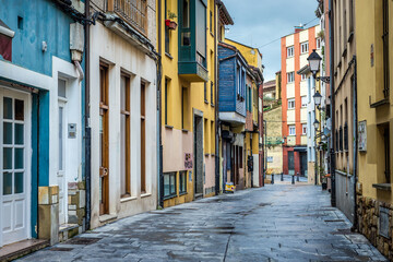 Fototapeta premium Town houses on Rosario Street in historic part of Gijon city, northwestern Spain