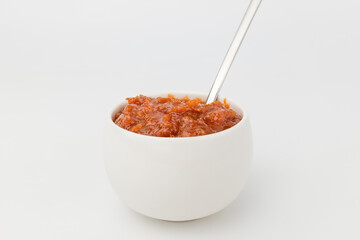 Brown ssamjang on white background