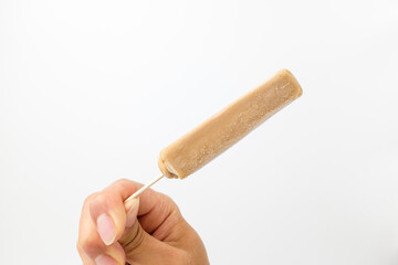Caramel ice cream on white background
