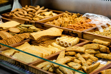 Fish cake sold at one of the food markets of Busan. Traditional fish cake, famous street food in Busan, South Korea, Asia