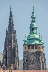 Fototapeta na wymiar Towers of Magnificent Saint Vitus Cathedral in Prague, Czech Republic, summer