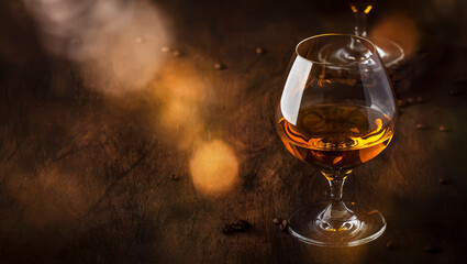 Armagnac, French grape brandy, strong alcoholic drink. Still life in vintage style, selective focus