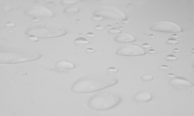 Water rain drops or drops of water on white background. Selective focus.