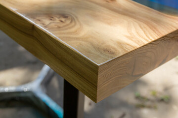 beautiful wooden table made of elm slab and epoxy resin